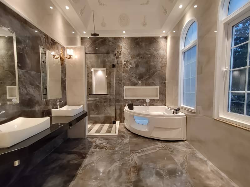 One Kanal Brand New Spanish Design Most Beautiful Owner Build Bungalow 2 Servant Quarter In Basement For Sale At Prime Location Of DHA Lahore Near To Park Masjid & Commercial Market. 24