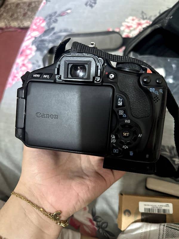 comes with camera bag, battery, battery charger and card reader 2