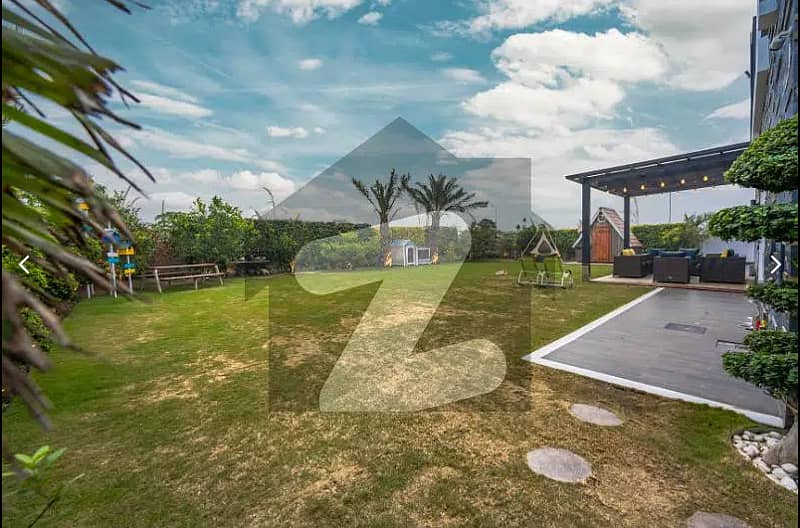 One Kanal BUNGALOW KANAL LAWN Luxury Ultra-Modern Design Most Beautiful Full Basement Swimming Pool Home Theater Bungalow For Sale At Prime Location Of DHA Lahore Near To Commercial Market 3