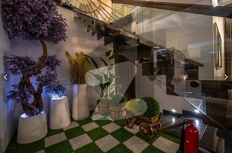 One Kanal BUNGALOW KANAL LAWN Luxury Ultra-Modern Design Most Beautiful Full Basement Swimming Pool Home Theater Bungalow For Sale At Prime Location Of DHA Lahore Near To Commercial Market 10