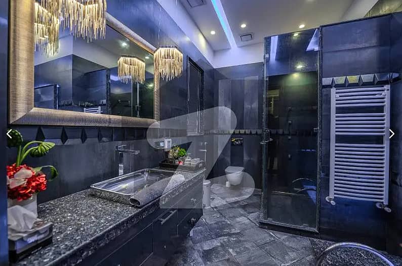 One Kanal BUNGALOW KANAL LAWN Luxury Ultra-Modern Design Most Beautiful Full Basement Swimming Pool Home Theater Bungalow For Sale At Prime Location Of DHA Lahore Near To Commercial Market 22