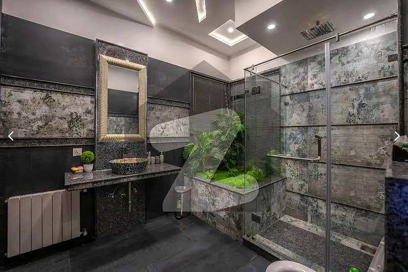 One Kanal BUNGALOW KANAL LAWN Luxury Ultra-Modern Design Most Beautiful Full Basement Swimming Pool Home Theater Bungalow For Sale At Prime Location Of DHA Lahore Near To Commercial Market 29