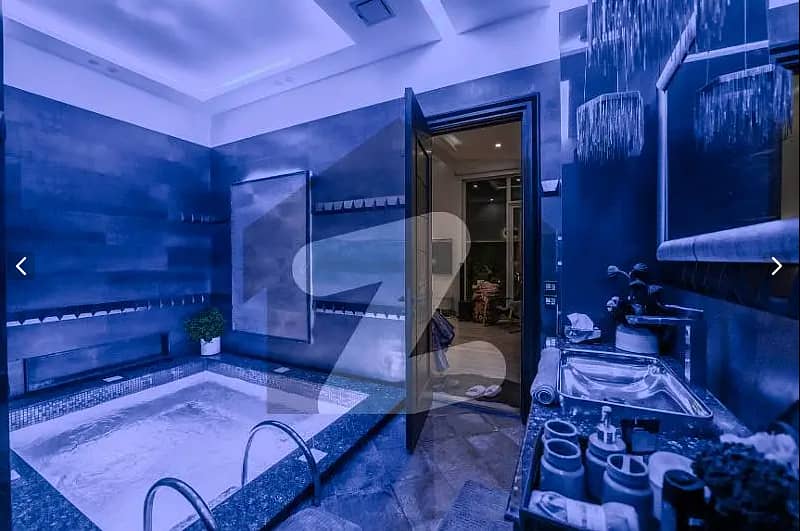 One Kanal BUNGALOW KANAL LAWN Luxury Ultra-Modern Design Most Beautiful Full Basement Swimming Pool Home Theater Bungalow For Sale At Prime Location Of DHA Lahore Near To Commercial Market 33
