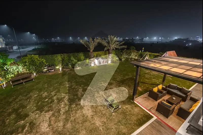 One Kanal BUNGALOW KANAL LAWN Luxury Ultra-Modern Design Most Beautiful Full Basement Swimming Pool Home Theater Bungalow For Sale At Prime Location Of DHA Lahore Near To Commercial Market 35
