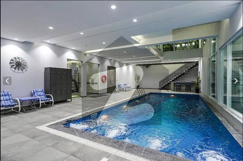 One Kanal BUNGALOW KANAL LAWN Luxury Ultra-Modern Design Most Beautiful Full Basement Swimming Pool Home Theater Bungalow For Sale At Prime Location Of DHA Lahore Near To Commercial Market 37
