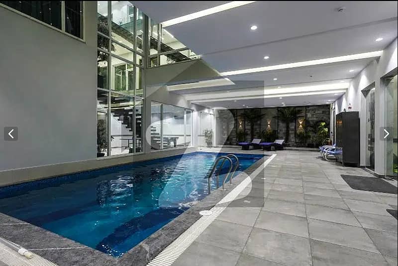 One Kanal BUNGALOW KANAL LAWN Luxury Ultra-Modern Design Most Beautiful Full Basement Swimming Pool Home Theater Bungalow For Sale At Prime Location Of DHA Lahore Near To Commercial Market 39