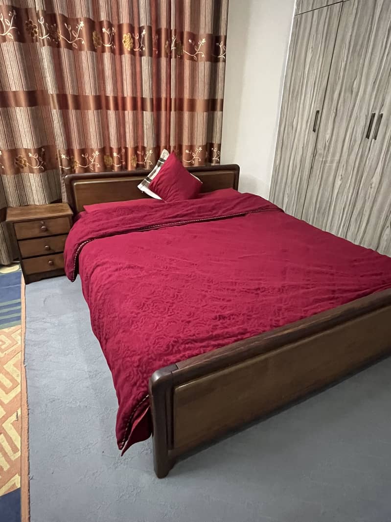 Bed with mattress and side table for sale 0