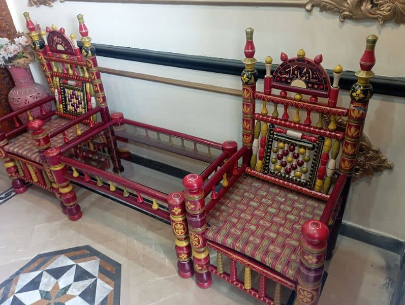 2 chairs with 1 center table 0