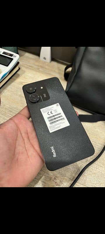 Redmi 13c mobile 6 months used with warranty 0