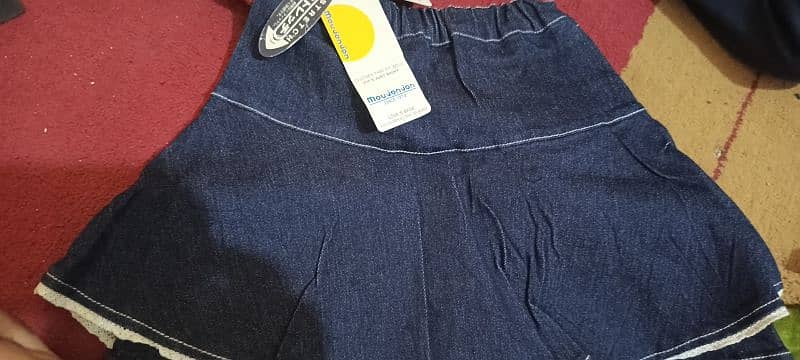 brand new tagged Denim skirt- 12 , length 1