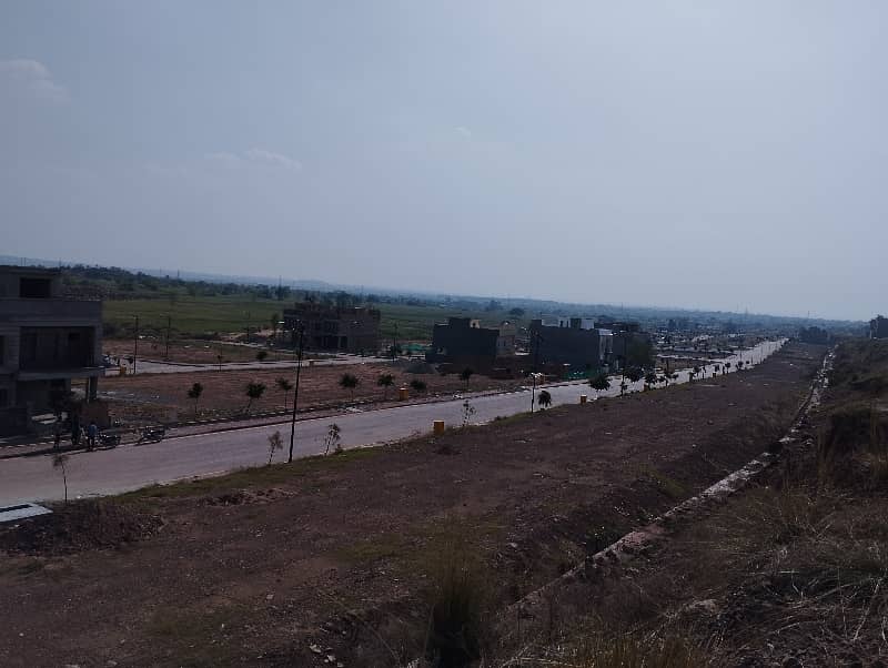 8Marla Solid land front open plot with stunning hills view 4