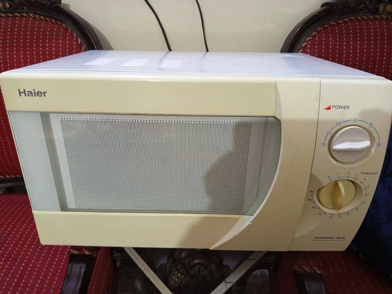 30 liter Haier microwave available for sale. 03289652709 3
