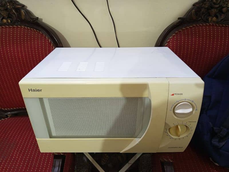 30 liter Haier microwave available for sale. 03289652709 4