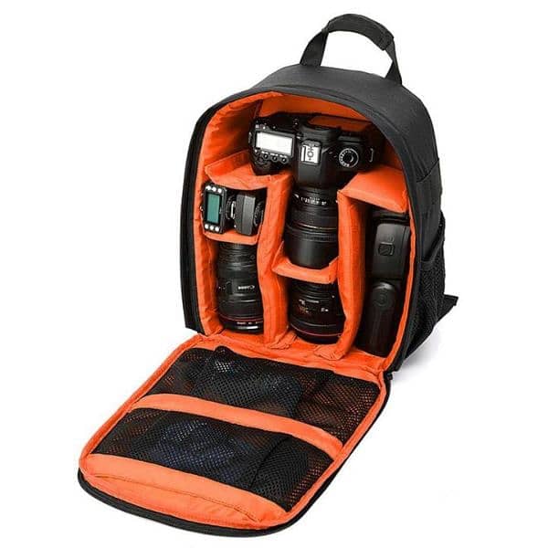 canon 700D with 18/135 lance SD card 64GB. large nikon bag pack 7