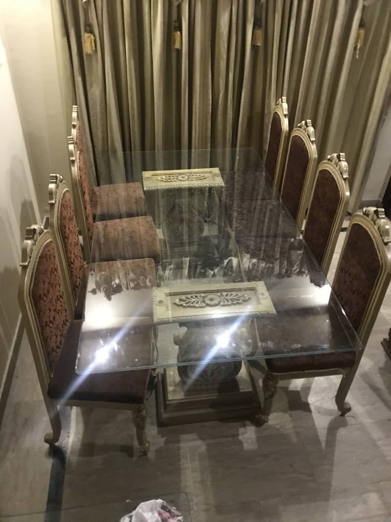 Large Glass table with 8 Golden colour chairs 1