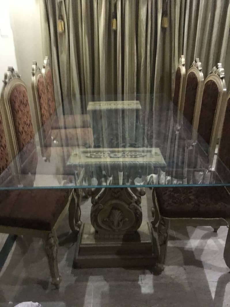 Large Glass table with 8 Golden colour chairs 2