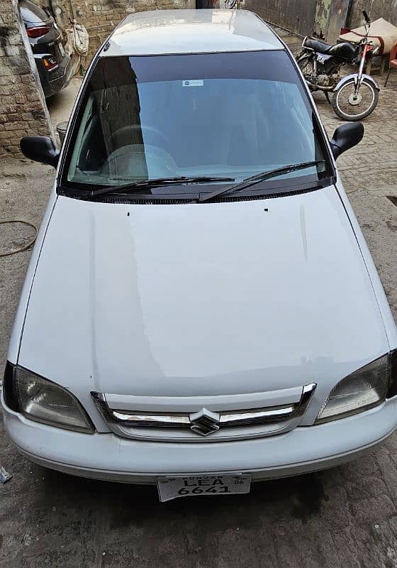 Suzuki Cultus VXR 2006 chat genuine 1 door Genuine bornet  touching 2