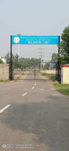 2 kanal Corner facing Park Wapda finance society it is a good chance very reasonable price level Plot surrounding barrier Orchard