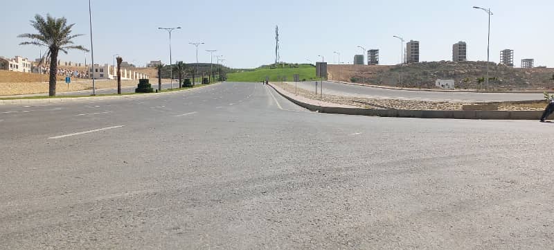 125sq Yard Plot FOR SALE In Precinct-10B. All Amenities Nearby Including MOSQUE, General Store &Amp; Parks 2
