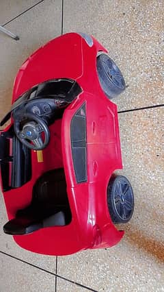charging red car with remote control,