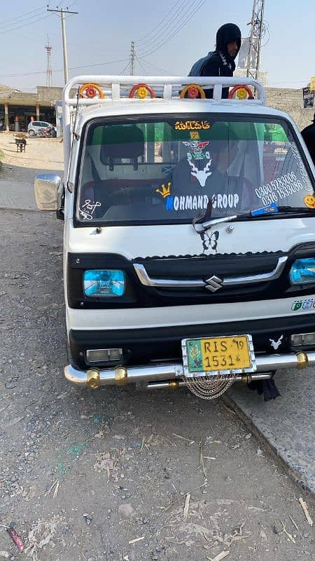Suzuki white loading van 0