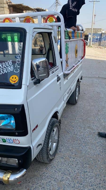 Suzuki white loading van 1
