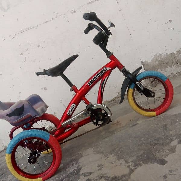 12 size tricycle for sale in good condition 2