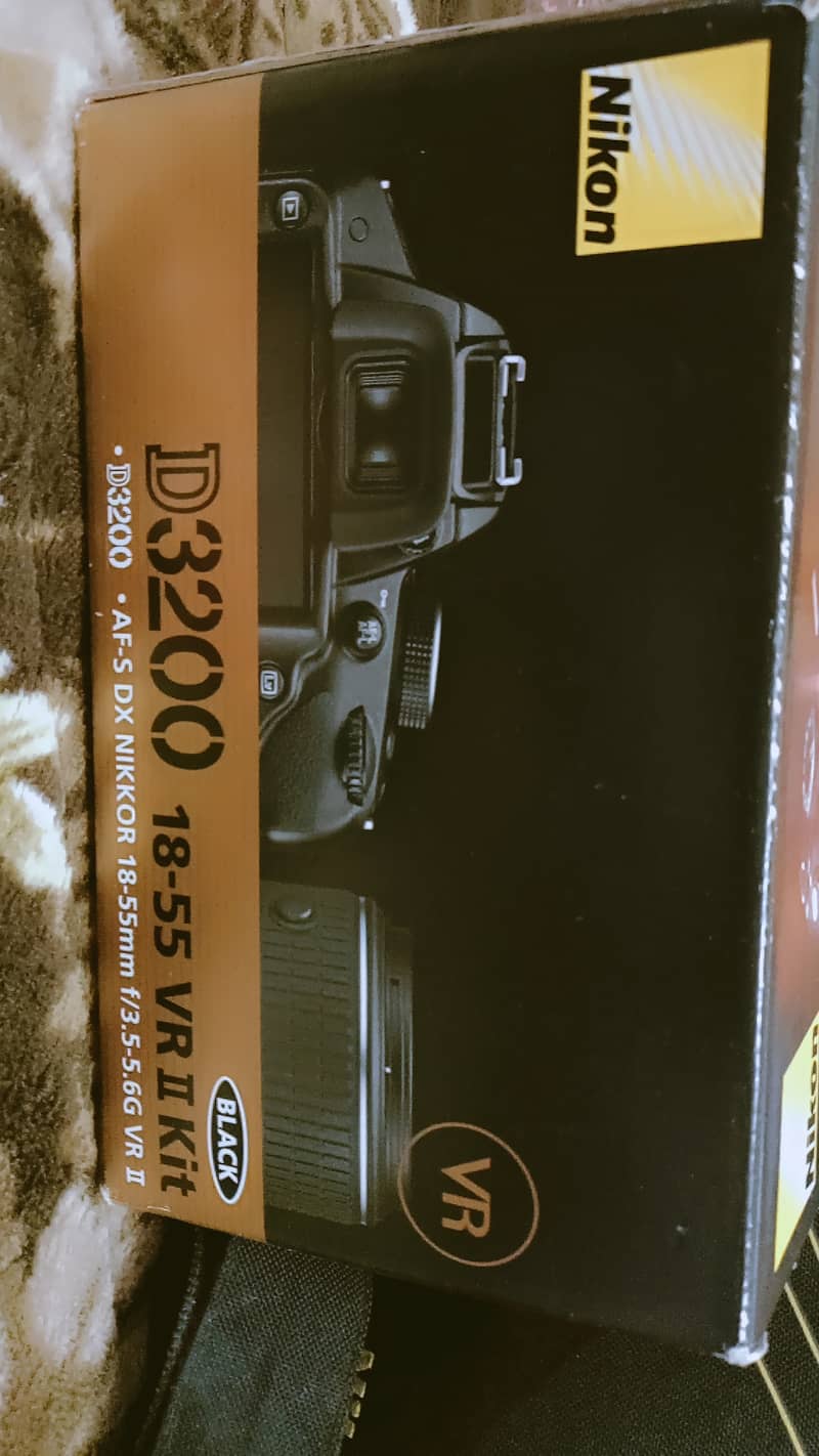 Nikon D3200 with 18-55mm lense 0