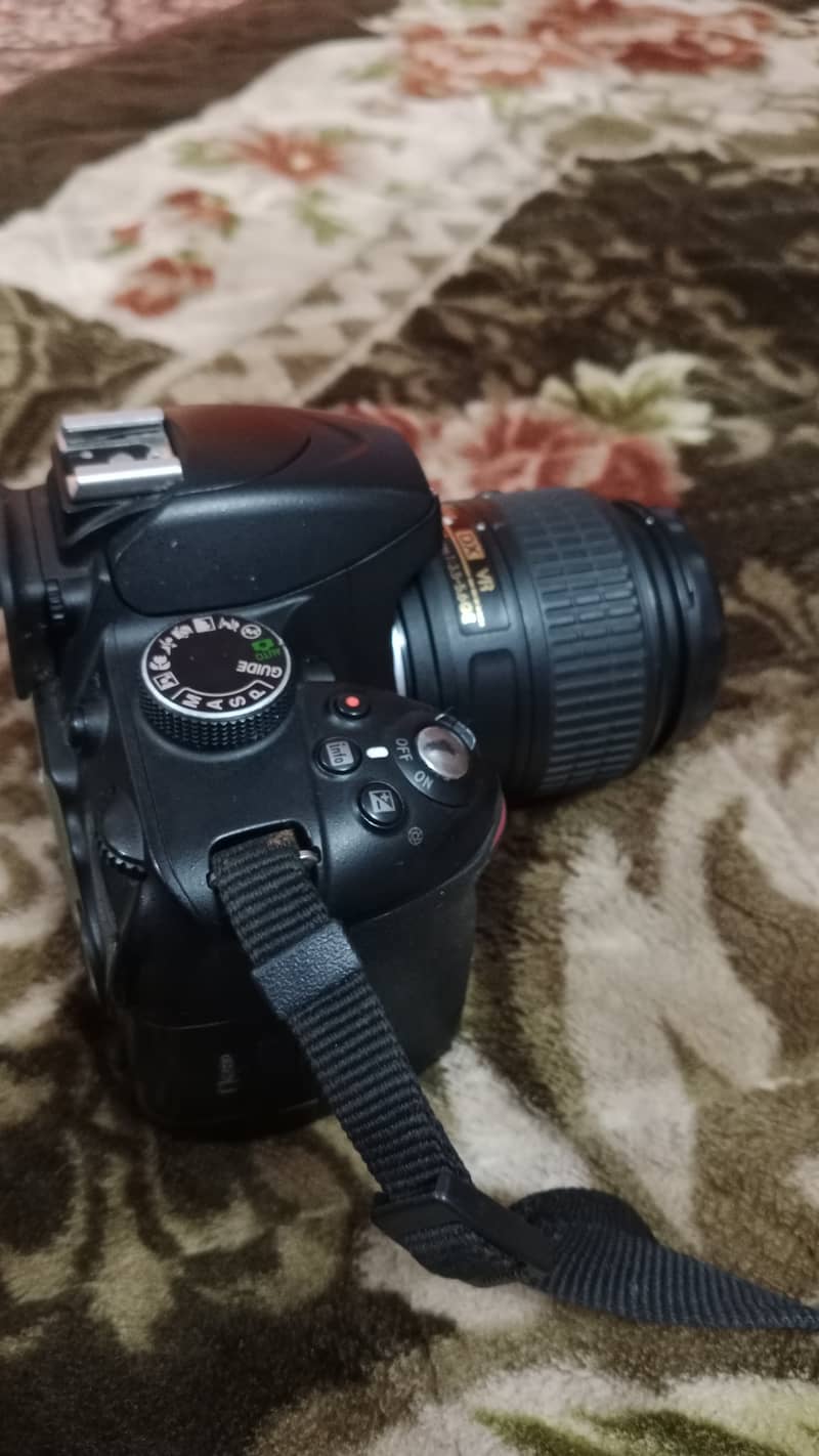 Nikon D3200 with 18-55mm lense 1