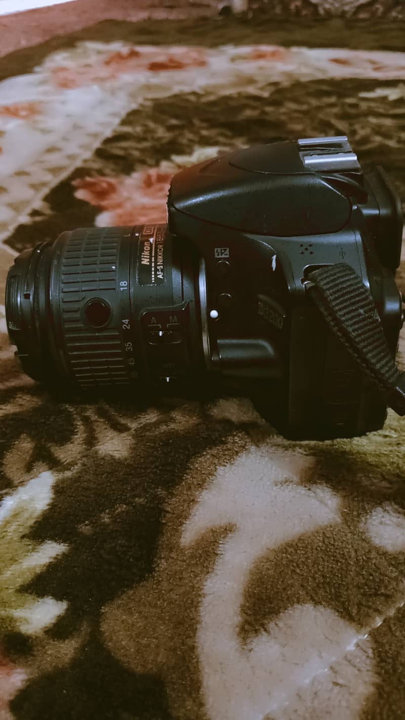 Nikon D3200 with 18-55mm lense 3