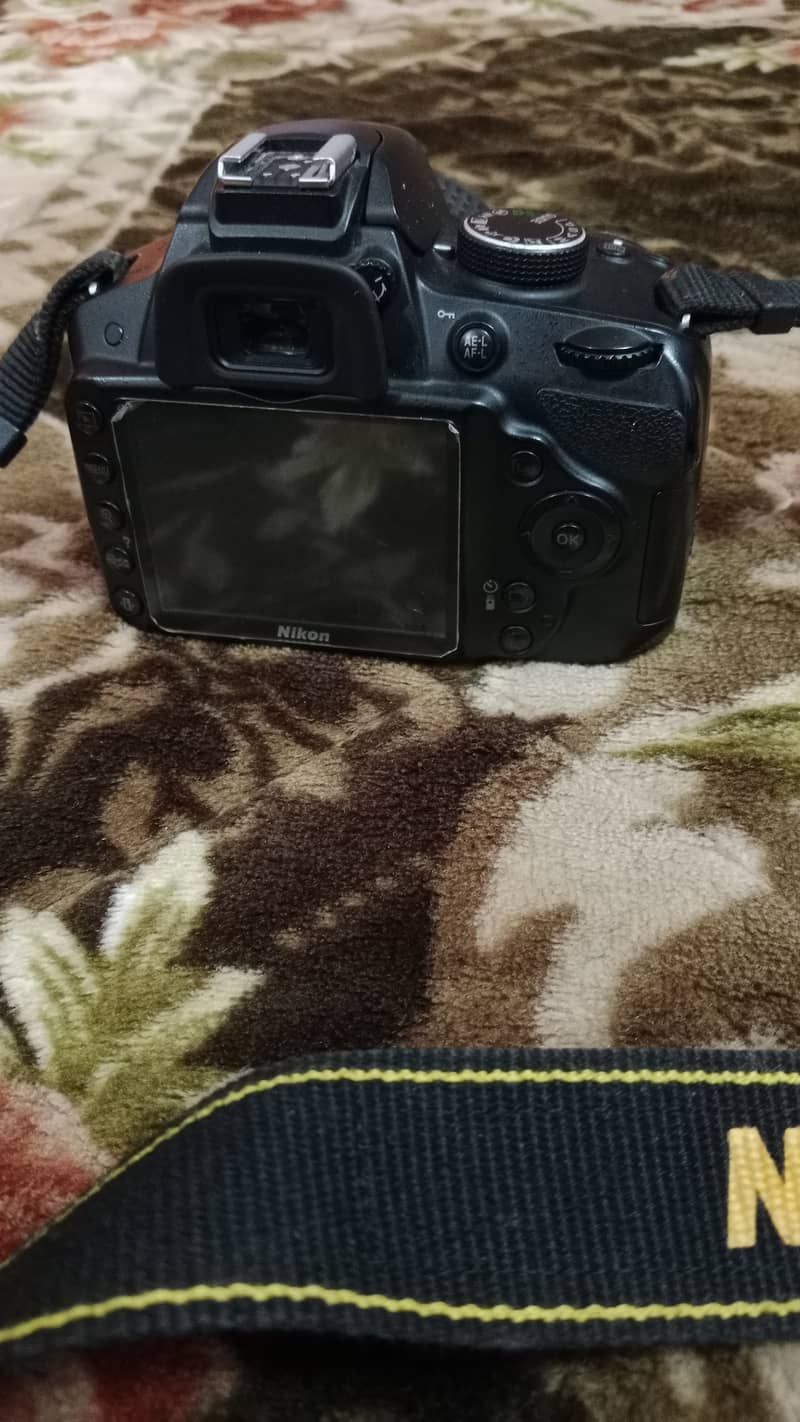 Nikon D3200 with 18-55mm lense 4
