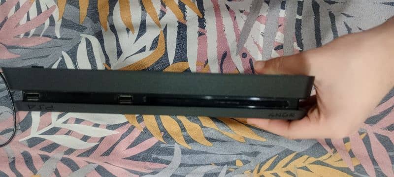 "PS4 Slim 500GB with Controller + 5 Games (RDR2 Free!) – Best Price!" 11