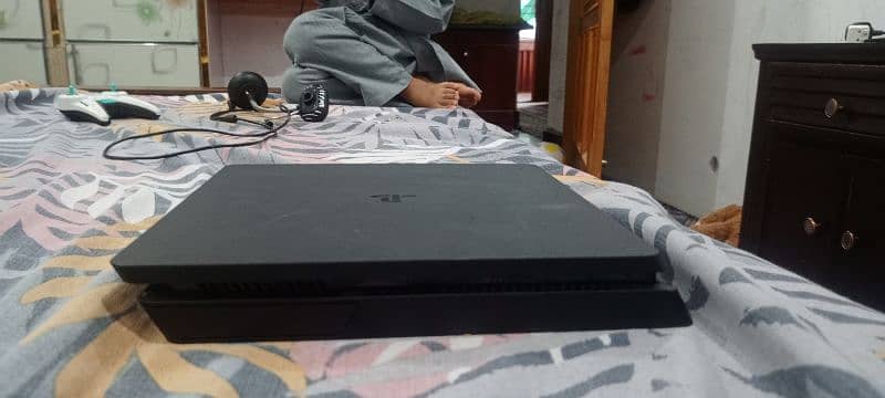 "PS4 Slim 500GB with Controller + 5 Games (RDR2 Free!) – Best Price!" 12