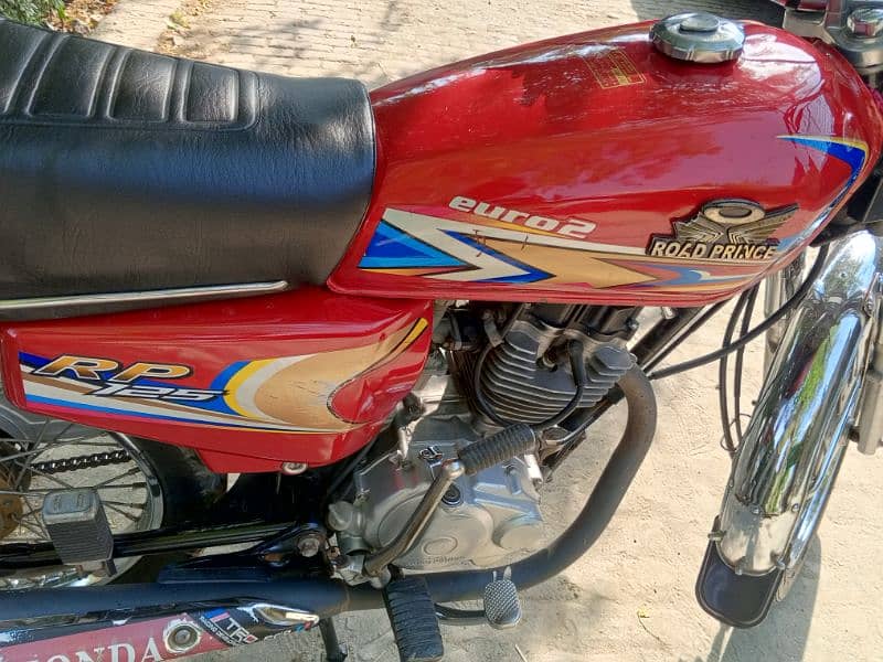 road prince 125 euro 2 bike red colour lahore number good condition 0