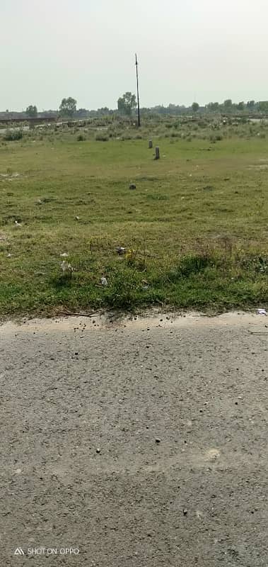 Premium Investment Opportunity 10 Marla Plot in DHA Phase 9 Prism | Direct Ring Road Access 2