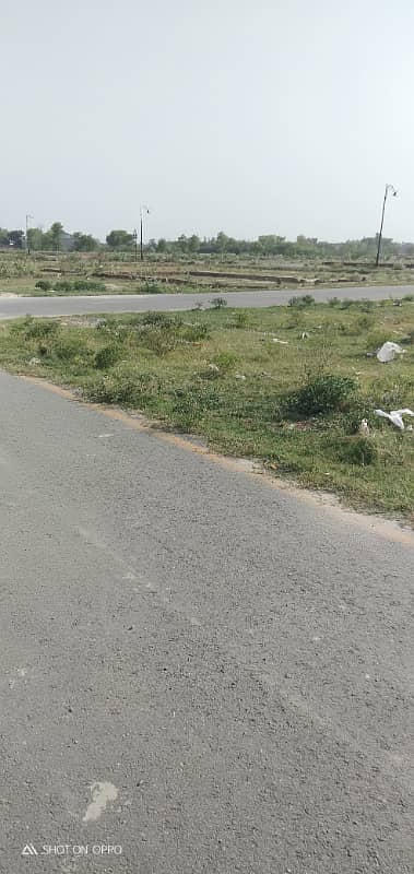 Premium Investment Opportunity 10 Marla Plot in DHA Phase 9 Prism | Direct Ring Road Access 5