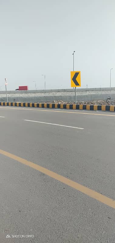 Premium Investment Opportunity 10 Marla Plot in DHA Phase 9 Prism | Direct Ring Road Access 13