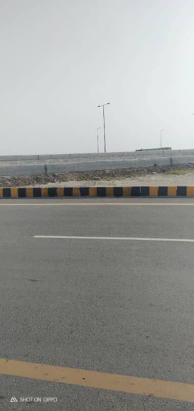 Premium Investment Opportunity 10 Marla Plot in DHA Phase 9 Prism | Direct Ring Road Access 14