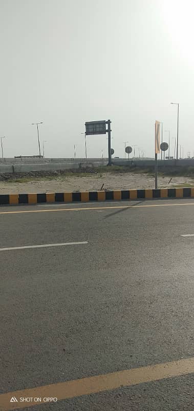 Premium Investment Opportunity 10 Marla Plot in DHA Phase 9 Prism | Direct Ring Road Access 15