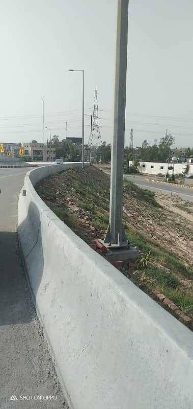 Premium Investment Opportunity 10 Marla Plot in DHA Phase 9 Prism | Direct Ring Road Access 17