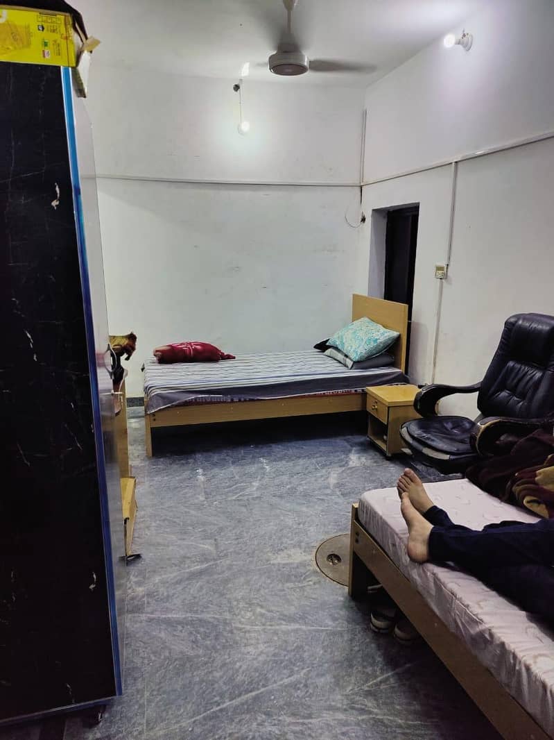 Boys Hostel Lahore -Solar Electricity, Single Bed, Gated Parking, Wifi 1