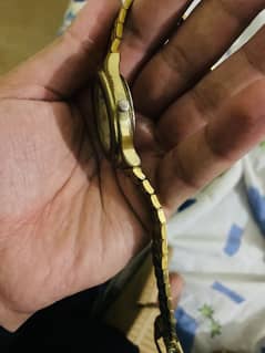 Gold arabic watch