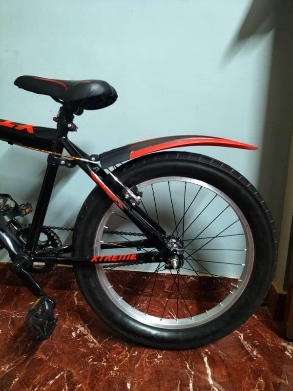 Mountain cycle Red and black, only used 2 or 3 times fully new. 1