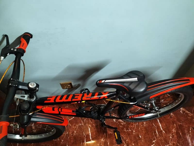 Mountain cycle Red and black, only used 2 or 3 times fully new. 3