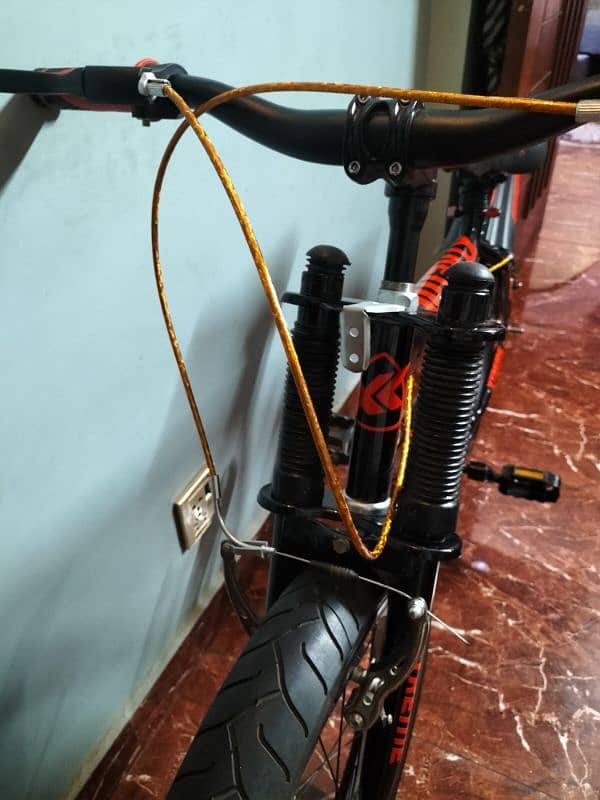 Mountain cycle Red and black, only used 2 or 3 times fully new. 4