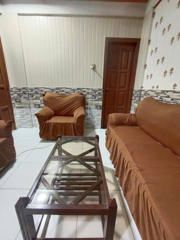 5 seater sofa set with free wooden glass table 0