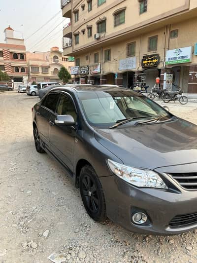 COROLLA 2010 1.8 SUNROOF UPLIFT 2013
