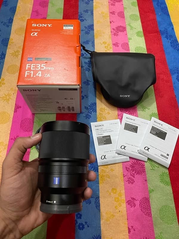 Sony 35mm 1.4 Zeiss it’s like sigma DG DN with box 6