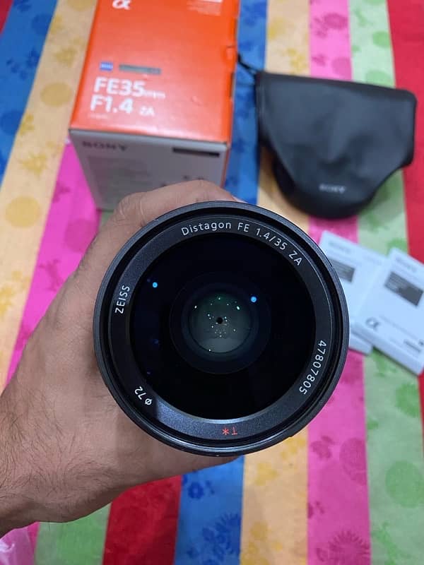 Sony 35mm 1.4 Zeiss it’s like sigma DG DN with box 7