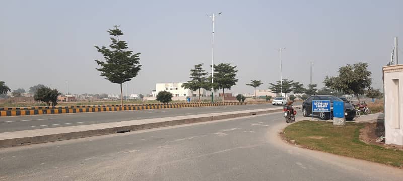 Prime Commercial Investment! 4 Marla Commercial Allocation File for Sale in DHA Phase 7 High Return Potential! 1
